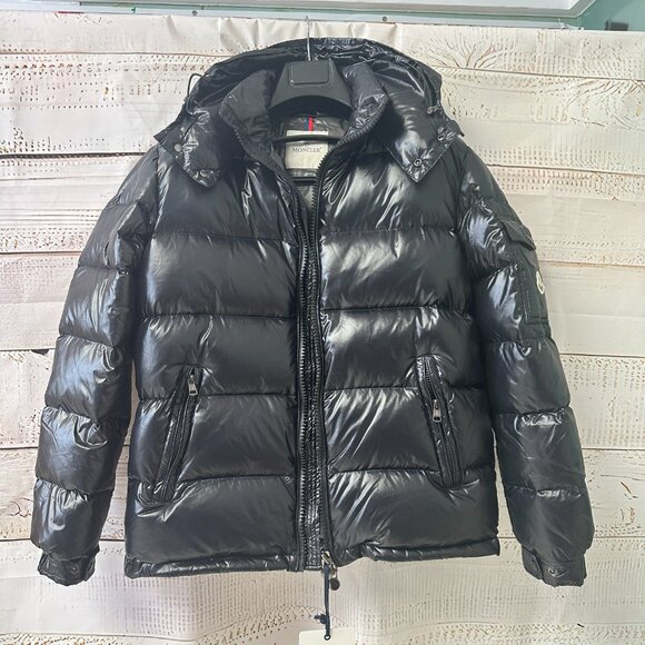 This Moncler down jacket, though a men's style - Picture 3 of 7